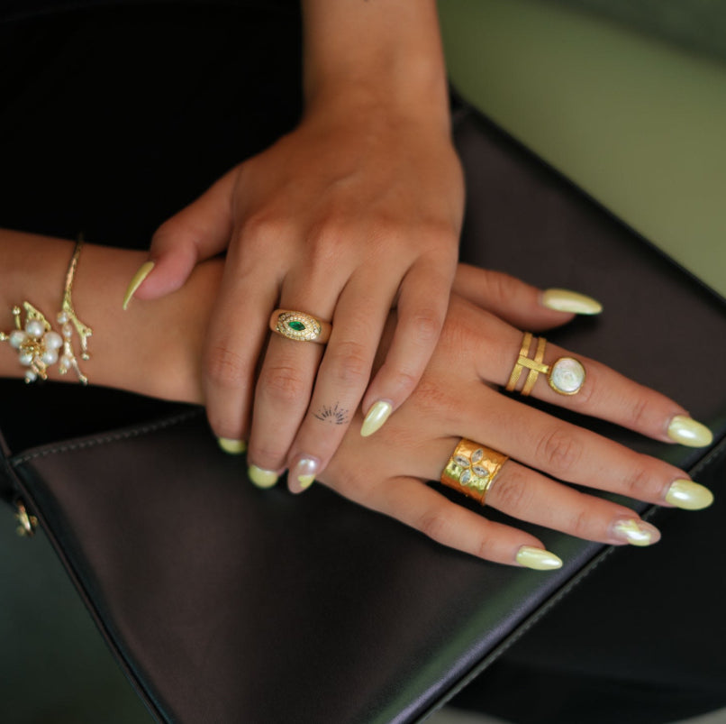 Bague ajustable œil protecteur en or 18k Avec un émeraude
